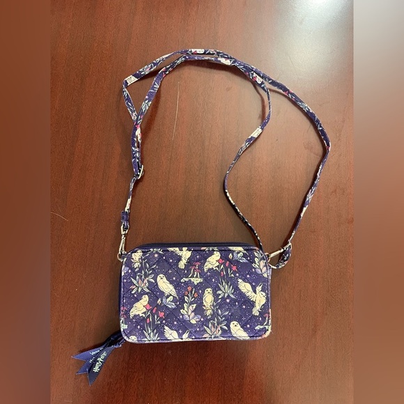Vera Bradley Handbags - Vera Bradley Harry Potter Print Crossbody Bag in Purple